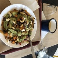 Main dish with green curry sauce at Andy's Kitchen in Lyon