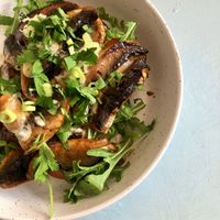 Miso beans on toast with vegan cream cheese, tomatos and rocket  at Dill's Cafe & Store in Falmouth