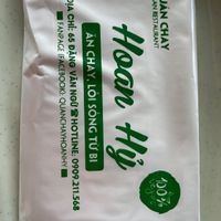 Wet wipe with restaurant details  at Hoan Hỉ Vegan in Qui Nhon