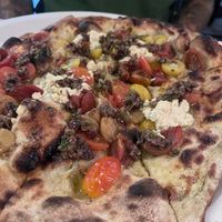 Vegan ricotta, olive tapenade and roasted cherry tomatoes.   at Pizzeria Toro in Durham