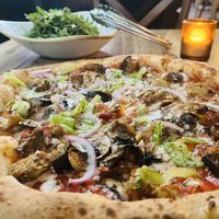Vegan pizza and rocket saladd  at Andiamo in Chippendale