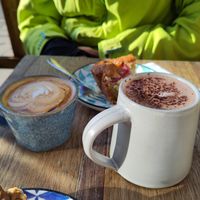 Two vegan cakes, an oat flat white and oat hot chocolate at Stanley & Ramona in York