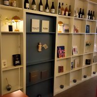 The toilet is behind these shelves at Beyla in Copenhagen