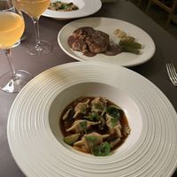 Pumpkin Agnolotti. Brussel Sprouts. Umami Broth plus Lions main mushroom  at Beyla in Copenhagen