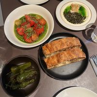 First course: Danish tomatoes, labneh, focaccia, peppers   at Beyla in Copenhagen