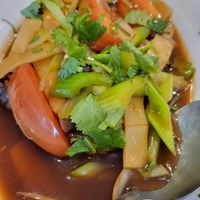 Vegggie fish and tomato sauce at Quan Yin in Houston