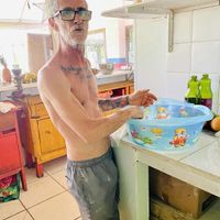 The owner and chef preparing food  at Vegano Carioca in Armacao Dos Buzios