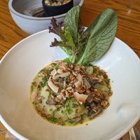 Curry with seasonal vegetables, shitake and crunchy seeds on top at Le Sain Bol in Montreal