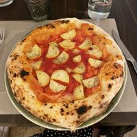 Tomato pizza with roasted potatoes  at Brama in Castello Di Godego