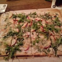 Vegan tarte flambee (apple, cheese and ruccola) at Gasthof zur alten Feuerwache in Bad Hoenningen