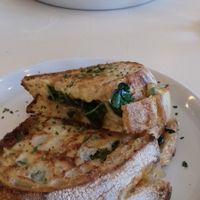 Sourdough toasties, with side salad on one plate at Culture - Cafe & Deli in Inverness