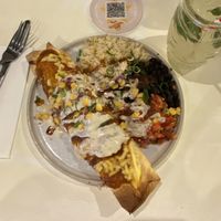 Overhead view of the vegan enchiladas and my mocktail (virgin mojito).  at Tres Mexican in Seaford