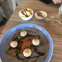 sesame and peanut mochi with ice cream separated from dish  at Yume Cocina Fusión Japonesa in Puerto Natales