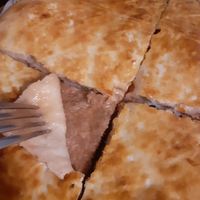 Vegan khachapuri with veg-meat at Saperavi Cafe in Moscow