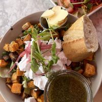 Baked potato salad with vegan feta cheese  at Café Blå Katten in Mariefred