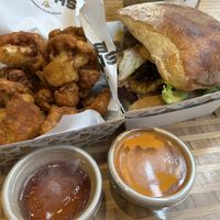 Cauliflower bites accompanied by maple syrup (just say no) and Boom Boom Nutriboom burger before it fell apart    at Bacon Bros Present Shaka Bros in Christchurch