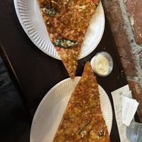 €15 meal deal for these two slices, the dip & one bottle of water.   at Bambino in Dublin