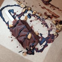 Snickers cake on a stick (a bit demolished because it was in the backpack) at Katzentempel - Augsburg in Augsburg