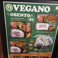 Storefront add promoting vegan options at Somenoya in Barcelona