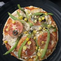 Ok pizza overall, a little small, they do well to be an all vegan restaurant.   at Jai Jagannath in Ao Nang