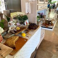 Table with vegan cakes and other baked goods at Ksana 크샤나 in Busan