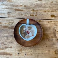 Oat milk latte with dried flowers at Ksana 크샤나 in Busan