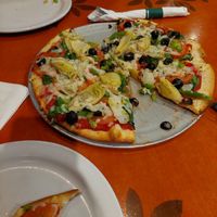 Pizza with vegan cheese at Bazbeaux Pizza in Indianapolis