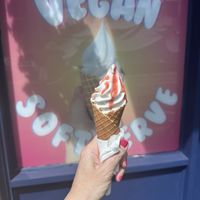 Vegan soft serve with freshly made waffle cone and strawberry topping. This alone is worth a visit!  at Blondies Vegan Proteins + Cafe Hawaii in Honolulu