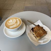 Oat milk latte and raspberry crumble cake  at mtl cafe & bakery in Seoul