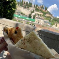 focaccia with onion and  with olives and tomatoes   at Focacceria Genovese in Verona