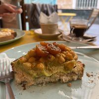 Vegan toast with guacamole, chickpeas, and tomato’s    at Pan de Limón in Cadiz