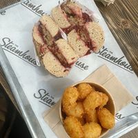 Vegan roast bagel & tater tots  at The Steamhouse in Redditch