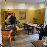 Library and art at Toucan Cafe in Minehead