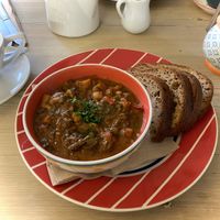 Sweet potato, pepper and peanut soup ❤️🧡💛  at Toucan Cafe in Minehead