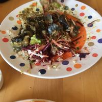Aubergine, peanut and coconut curry with brown rice and salad.  at Toucan Cafe in Minehead