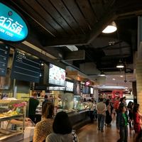 Still open, Sept 15, 2017. Coming from the cashier stand, the stall is on the first row to your right. it will be on your left, after walking toward the front. Note the ";london bridge"; in background.  at BKK - Veg Stall Food Court - T21 in Bangkok