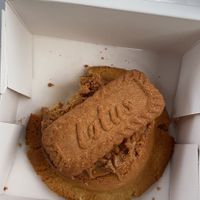 Lotus Biscoff Cookie (met al een hap eruit🤪) at Belicio Cheats in Amsterdam