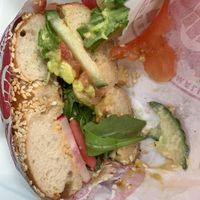 This beautiful sandwich with the pickled veggies *chefs kiss*   at Bagel Uprising in Alexandria