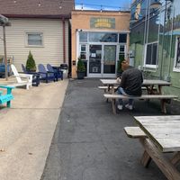 There she is! Such a cute little store front, with all that outdoor seating (more picnic tables not photographed)  at Bagel Uprising in Alexandria