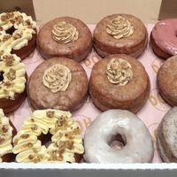 Maple pecan, pumpkin spice, raspberry, sugar, vanilla glaze, and lemon-poppy seed doughnuts at Doh in Glasgow