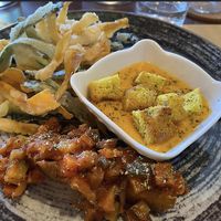 Antipasto misto con verdure pastellate, crema di zucca con crostini di focaccia,  polenta con ragù di verdure   at Kirù Focacceria Bistrot & Drinks in Livorno