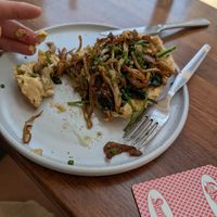 Hummus spinach mushroom olive oil toast...  This is half of it... at Neighbourhood Cafe in Lisbon