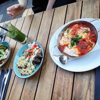Shakshuka (not vegan), barbecued aubergine (eggplant) and broccoli with Muammara at Die Kurve in Dusseldorf