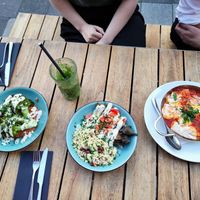 Shakshuka (not vegan), barbecued aubergine (eggplant), and broccoli with Muammara at Die Kurve in Dusseldorf