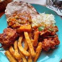 Onion bhaji 
Cauliflower manchurian
Grandmas Aloo matra
Dum pulao rice
Chacha chips
Tandoori roti at My Delhi Sunderland Indian Restaurant in Sunderland