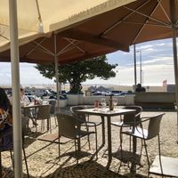 outdoor seating  at Offshore Petisqueira in Figueira Da Foz