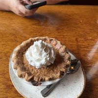Vegan peach pie with coconut whip cream   at The Drift Inn in Yachats