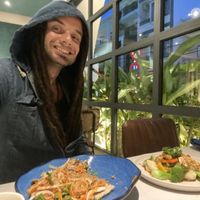 Me enjoying the Squeezed Mushroom Stem Salad and the Five-Color Veggies with Mushroom Sauce!  at SHAKTI in Nha Trang