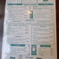 Menu with marked vegan items at Cosy Café in Budapest