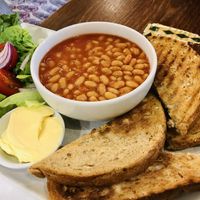 Beans on toast with vegan butter   at Barter Books in Alnwick